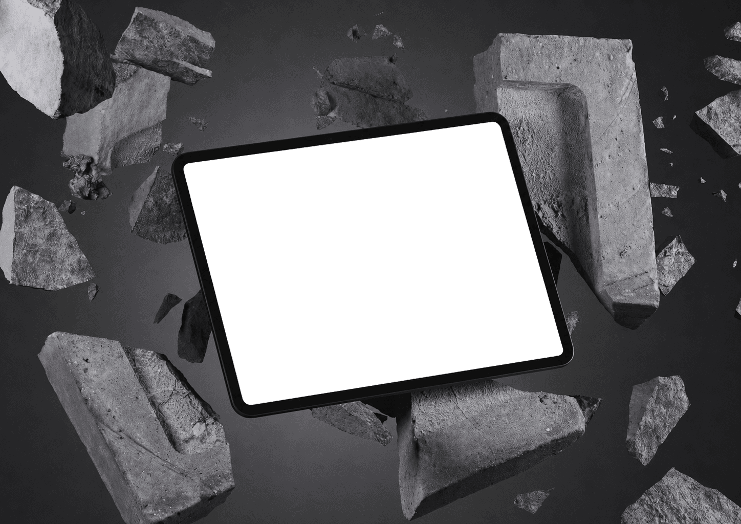 Tablet displaying the Racket Hoodie product website surrounded by floating stone debris