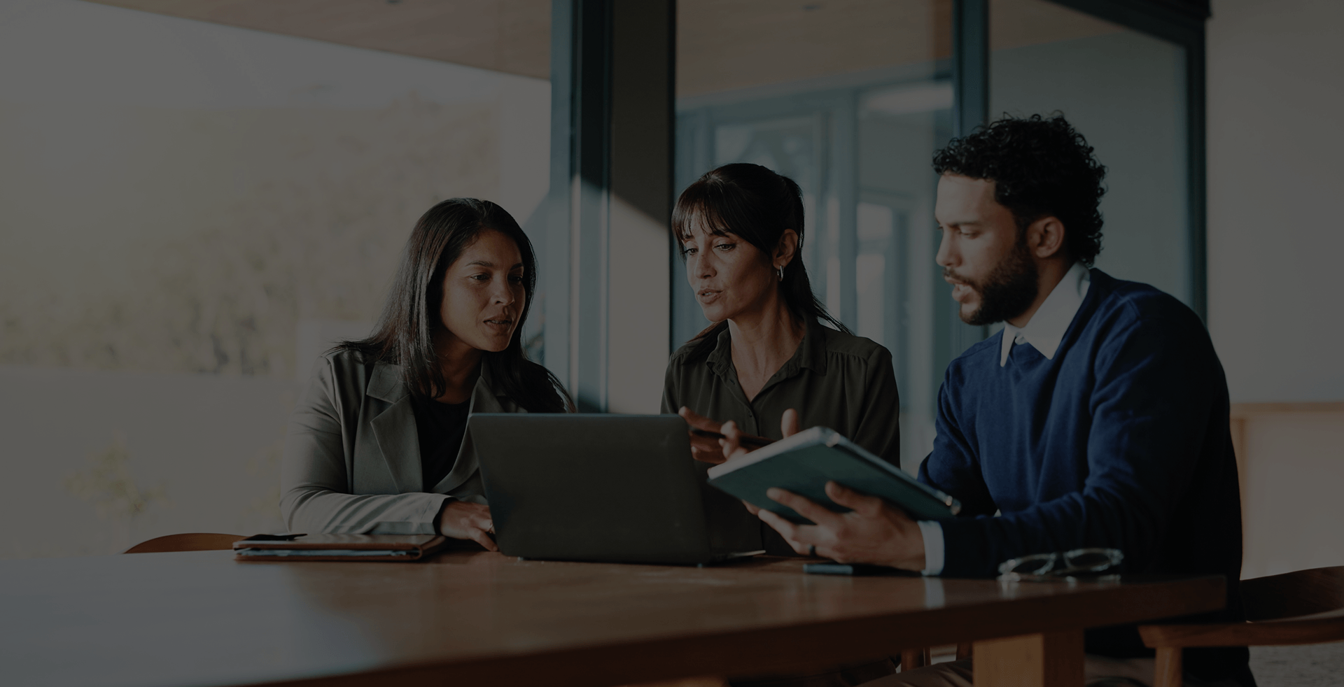 Branex team collaborating in a modern office